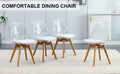 Modern Chairs Can Rotate 360 Degrees. The Backrest Is Made Of Pet Material, The Seat Cushion Is Made Of Pu Material, And The Support Legs Are Made Of Oak. Set Of 4 White Wood