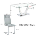 Table And Chair Set.Contemporary, Minimalist Rectangular Dining Table Featuring A Clear Tempered Glass Top And Sleek Silver Legs. Paried With Chairs Made Of Pu Material Cushion And Silver Metal Legs. Gray Seats 6 Glass Metal