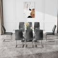 Table And Chair Set.Contemporary, Minimalist Rectangular Dining Table Featuring A Clear Tempered Glass Top And Sleek Silver Legs. Paried With Chairs Made Of Pu Material Cushion And Silver Metal Legs. Gray Seats 8 Glass Metal