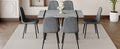 Table And Chair Set. A Minimalist Retro Rectangular Dining Table With A Specially Textured Top And Black Metal Legs, Paired With 6 Soft Chairs And Black Metal Legs, Showcases A Beautiful Home Style.