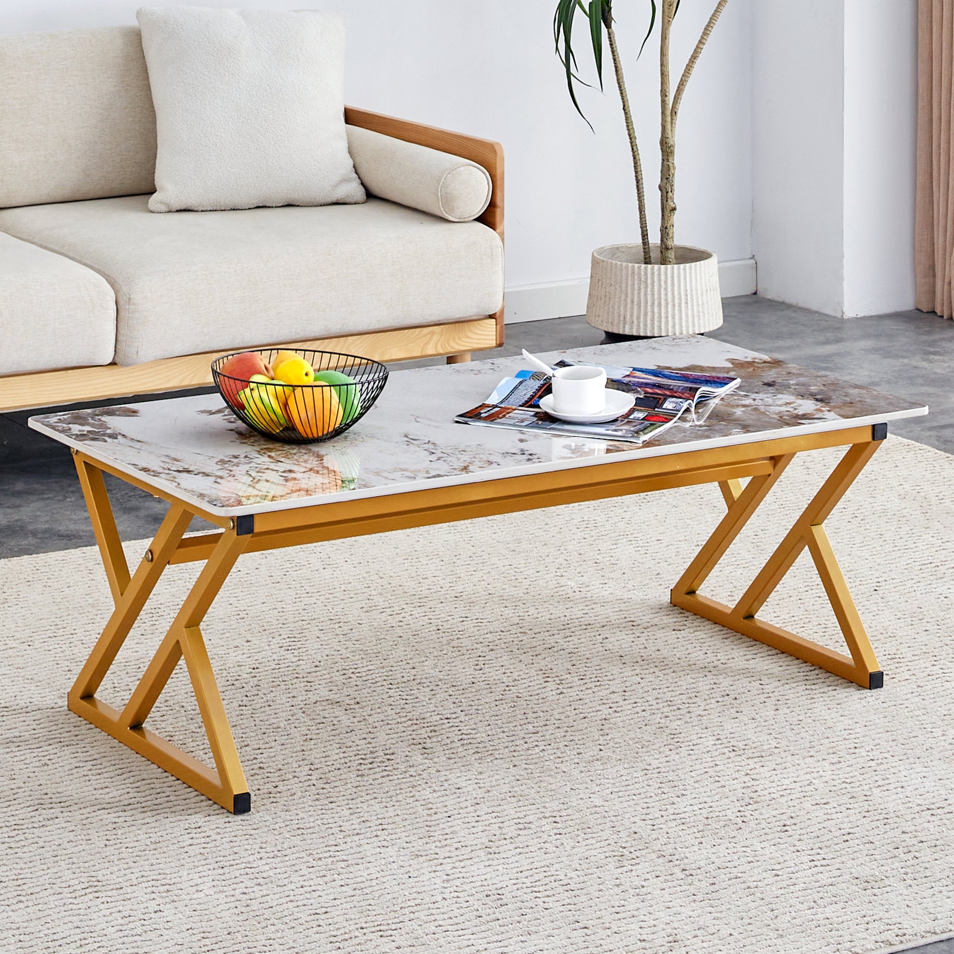 A Coffee Table Is Made Of Rock Slab Material, With A Natural And Smooth Marble Pattern On The Surface, Which Complements The Modern Design Of The Golden Metal Legs And Adds A Touch Of Fashion.47*23.6 Gold Sintered Stone