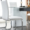 Table And Chair Set. Large Modern Rectangular Table With Glass Top And Large Mdf Legs. Comes With 8 Chairs With Faux Leather Upholstered Seats And Silver Metal Legs. White Seats 8 Mdf Glass