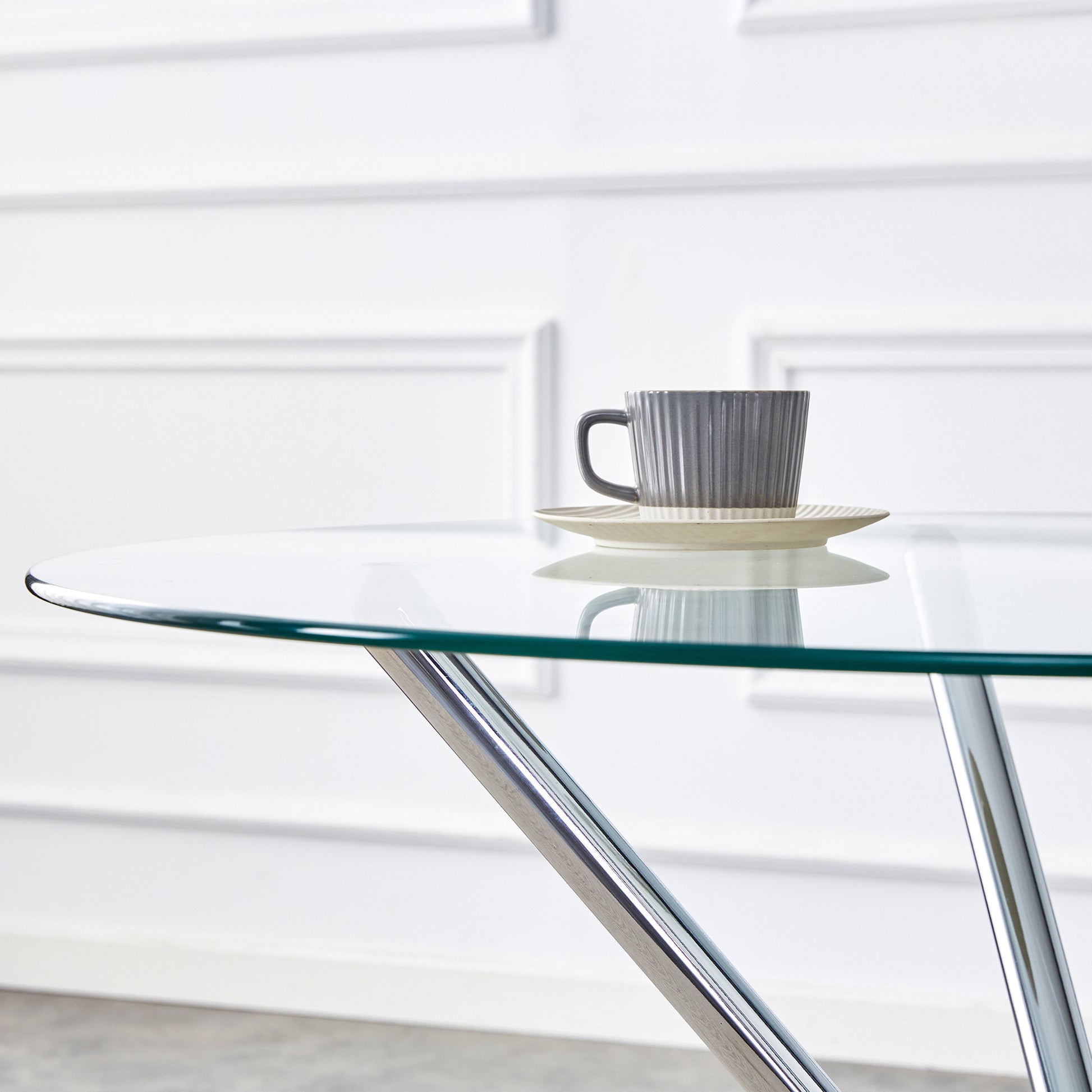 Table And Chair Set.36.6"Round Clear Glass Dining Table With A Unique Shape With Ring Shaped Gathered Silver Metal Legs.Paired With 4 White High Quality Pu Dining Chairs With Silver Metal Legs.