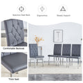 2 Piece Set Of Gray Armless Dining Chairs Brings A Touch Of Elegance And Mystery To The Dining Area With Its Deep Gray Tone,The Grid And Buckle Design Of The Back Add A Vintage Yet Fashionable Touch Gray Set Of 2 Pu