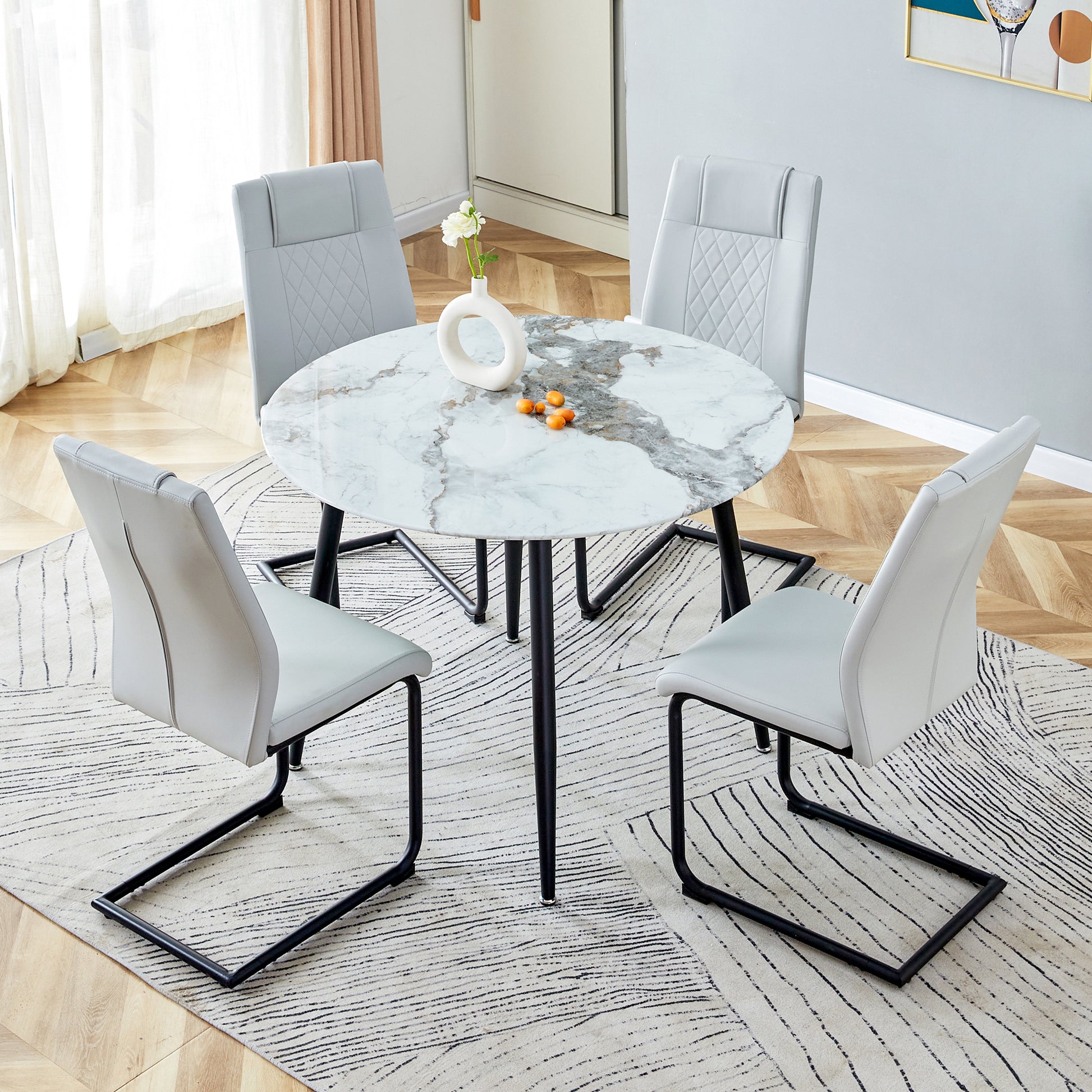 Table And Chair Set. Large Modern White Imitation Marble Patterned Round Table With Black Metal Legs. Nice Minimalism, Comfortable Seats And Black Metal Legs. White Gray Seats 4 Glass Metal