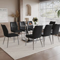 Table And Chair Set.Contemporary, Minimalist Rectangular Dining Table Featuring A Clear Tempered Glass Top And Sleek Silver Legs. Paried With Chairs Made Of Pu Material Cushion And Silver Metal Legs. Black Seats 8 Glass Metal