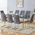 Table And Chair Set.Modern Rectangular Glass Dining Table With A Tempered Glass Tabletop And Metal Legs, Paired With Multiple Chairs Designed With Pu Cushions And Golden Metal Legs. Grey Gold Seats 8 Tempered Glass