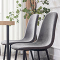 A Set Of 4 Modern Medieval Style Restaurant Cushioned Side Chairs, Equipped With Soft Cushions And Black Metal Legs, Suitable For Kitchens, Lounges, And Farmhouses. B0501A Dark Gray Foam Metal