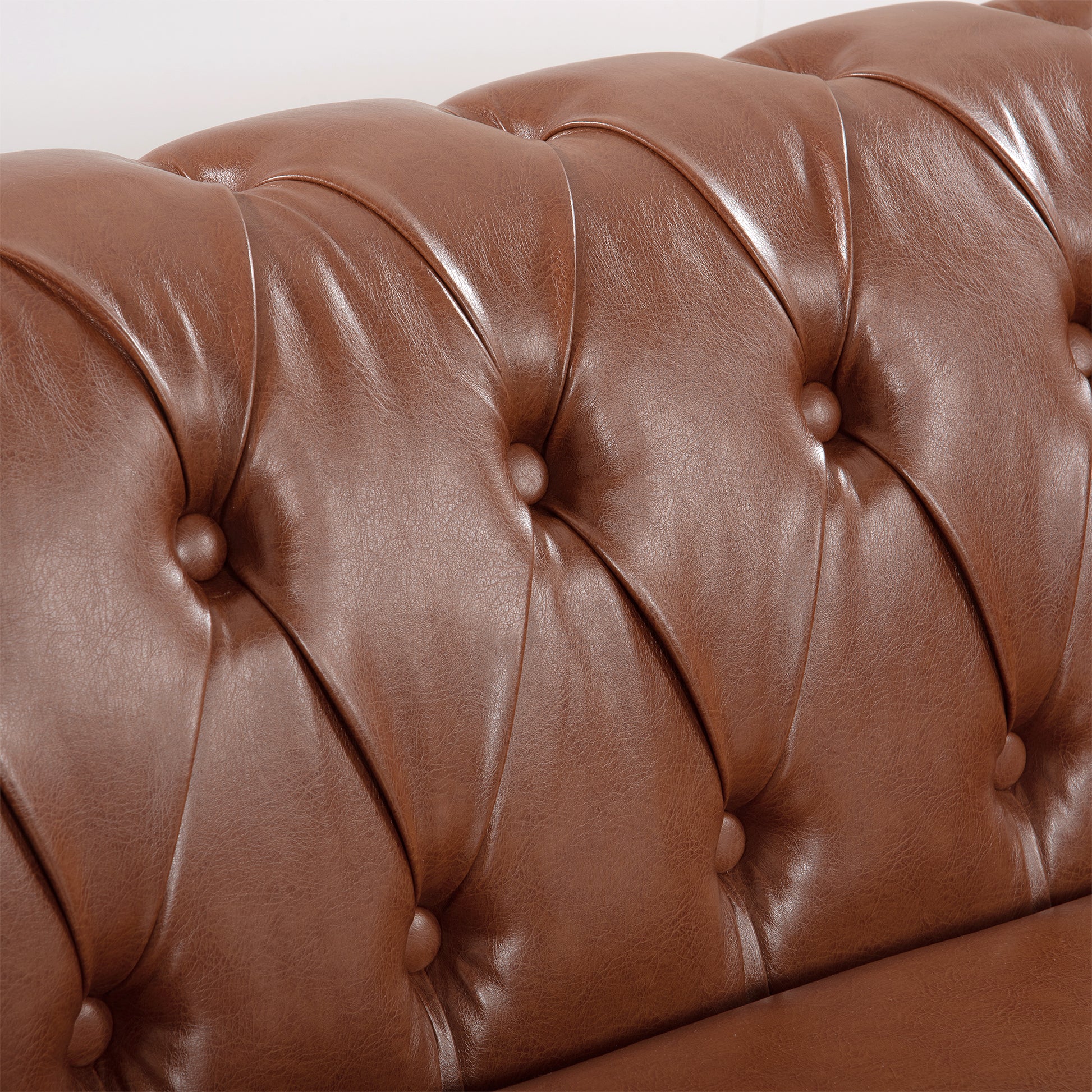 84.65"Brown Pu Rolled Arm Chesterfield Three Seater Sofa. Brown Foam Pu