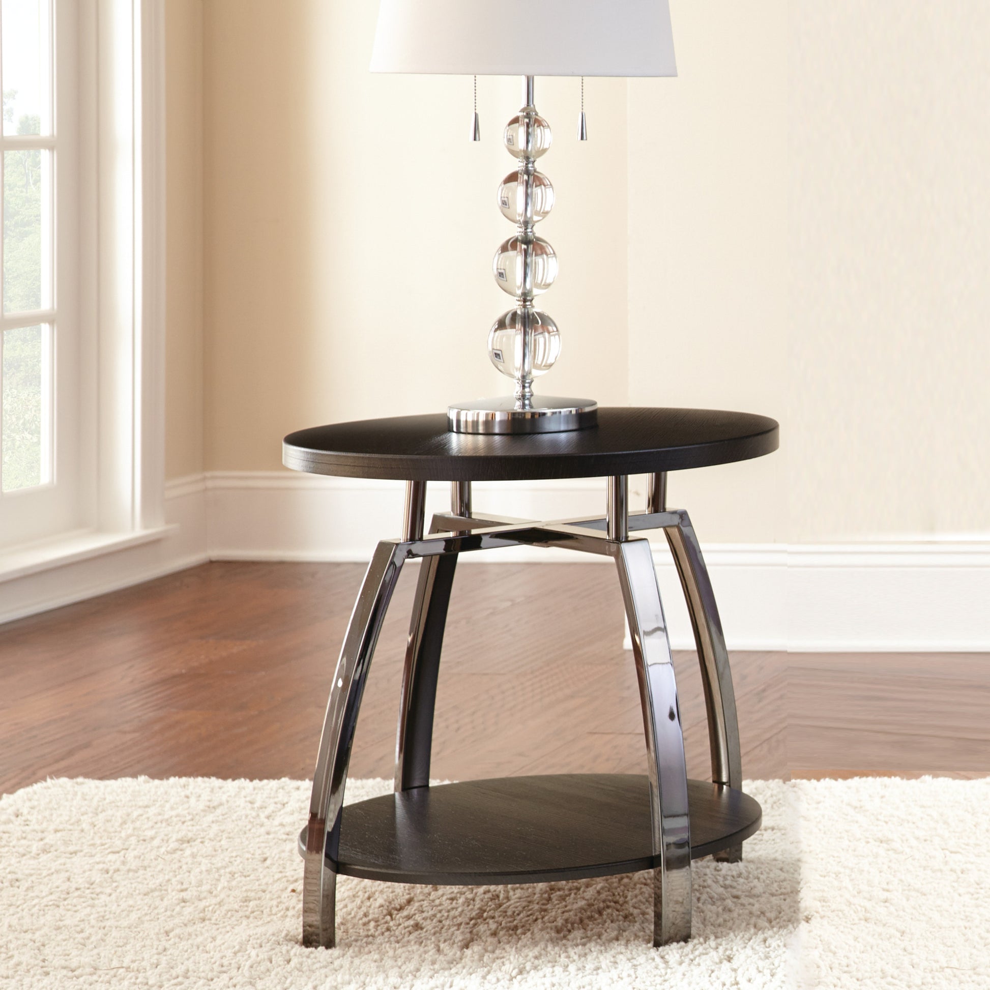 Elegant Table Collection Soft Round Shapes, Silvershield Laminate Tops Black Nickel Base, Aggressive Profile Cocktail Table With Casters" Black Solid Wood Mdf