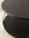 Elegant Table Collection Soft Round Shapes, Silvershield Laminate Tops Black Nickel Base, Aggressive Profile Cocktail Table With Casters Black Solid Wood Mdf