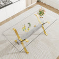 Dining Table. Modern Tempered Glass Dining Table. Large Modern Office Desk With Gold Plated Metal Legs And Mdf Crossbars, Suitable For Both Home And Office Use. Kitchen. 79 ''X39''X30 '' 1105 Transparent Glass