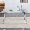 A Modern Minimalist Rectangular Glass Dining Table With Tempered Glass Tabletop And Silver Metal Legs, Suitable For Kitchens, Restaurants, And Living Rooms,63