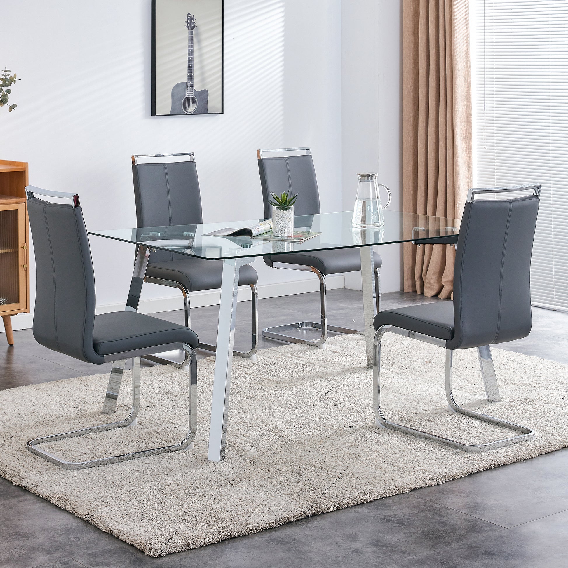 A Modern Minimalist Rectangular Glass Dining Table With Tempered Glass Tabletop And Silver Metal Legs, Suitable For Kitchens, Restaurants, And Living Rooms,63"*35.4"*30" Silver Metal