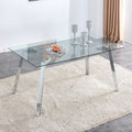 A Modern Minimalist Rectangular Glass Dining Table With Tempered Glass Tabletop And Silver Metal Legs, Suitable For Kitchens, Restaurants, And Living Rooms,63