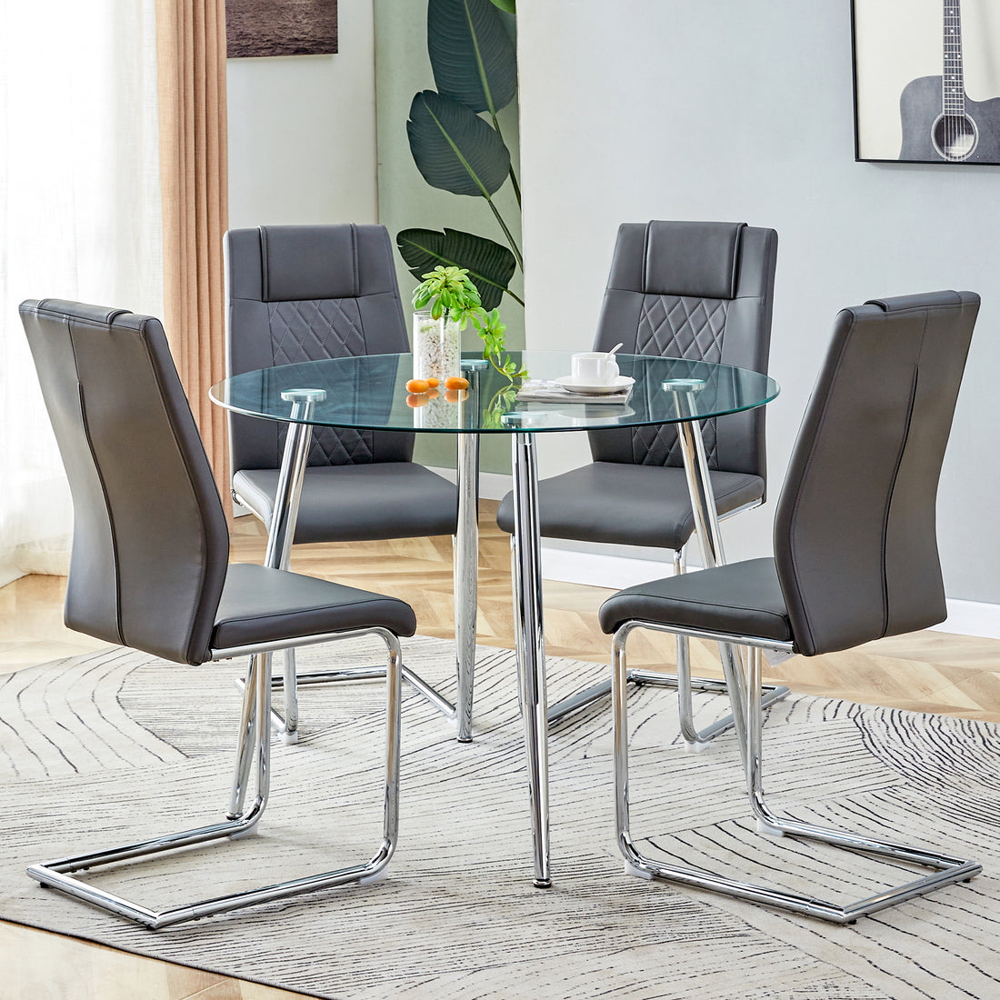 Table And Chair Set. 1 Table 4 Gray Chairs Round Dining Table With A 40 Inch Diameter Glass Tabletop And Silver Plated Metal Legs. 4 Gray Pu Chairs Dt 1164 001 Transparent Seats 4 Glass