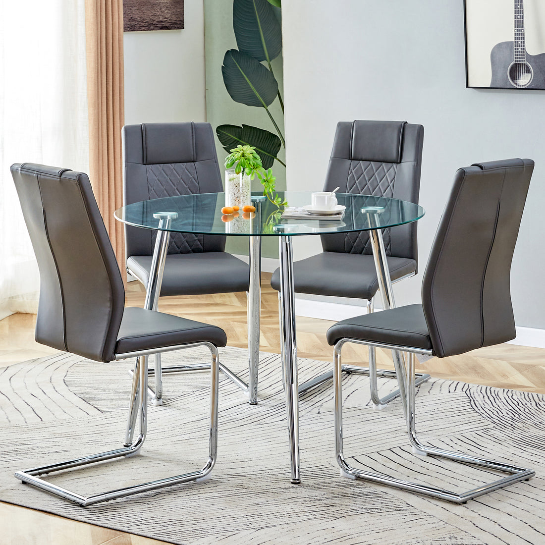 Table And Chair Set. 1 Table 4 Gray Chairs Round Dining Table With A 40 Inch Diameter Glass Tabletop And Silver Plated Metal Legs. 4 Gray Pu Chairs Dt 1164 001 Transparent Glass