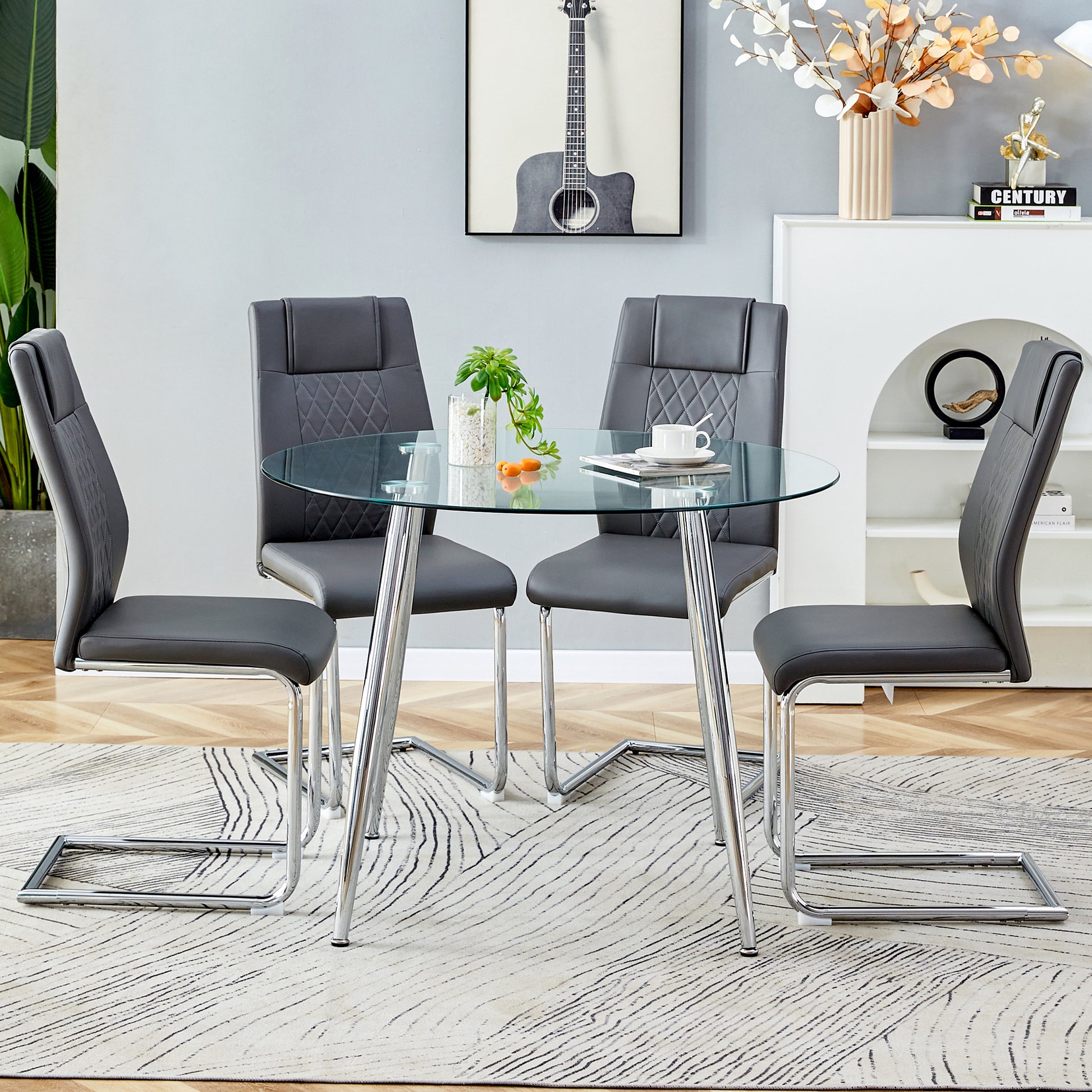 Table And Chair Set. 1 Table 4 Gray Chairs Round Dining Table With A 40 Inch Diameter Glass Tabletop And Silver Plated Metal Legs. 4 Gray Pu Chairs Dt 1164 001 Transparent Seats 4 Glass