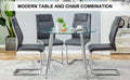 Table And Chair Set. 1 Table 4 Gray Chairs Round Dining Table With A 40 Inch Diameter Glass Tabletop And Silver Plated Metal Legs. 4 Gray Pu Chairs Dt 1164 001 Transparent Glass