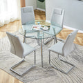 Table And Chair Set. 1 Table 4 Light Gray Chairs Round Dining Table With A 40 Inch Diameter Glass Tabletop And Silver Plated Metal Legs. 4 Light Gray Pu Chairs Dt 1164 001 Transparent Seats 4 Glass