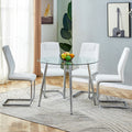 Table And Chair Set. 1 Table 4 Chairs Set A Circular Dining Table With A 40 Inch Diameter Glass Tabletop And Electroplated Metal Legs. 4 White Pu Chairs Dt 1164 001 Transparent Glass