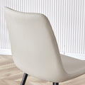 Light Gray Artificial Leather Backrest Cushion Dining Chair, Black Metal Legs, Curved Widened Cushion Design For More Comfort, Suitable For Restaurants, Kitchens, Bedrooms, Offices. 4 Chairs 0502 Light Gray Faux Leather