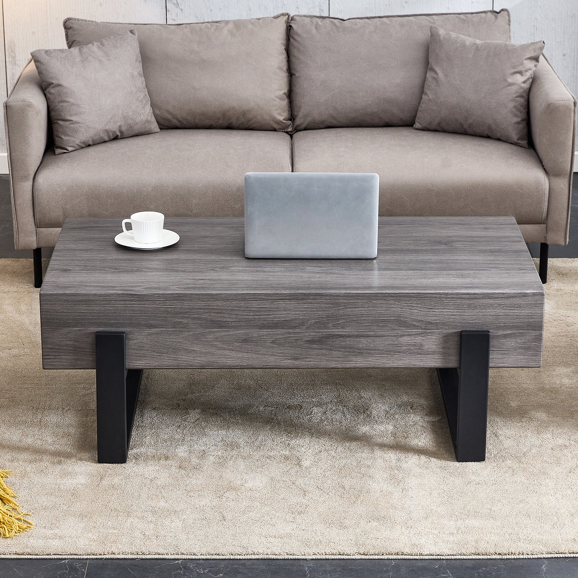 A Rustic Gray Wood Grain Mdf Coffee Table With Black Metal Legs An Elegant Space In Natural Wood Tones Grey Mdf