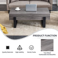 A Rustic Gray Wood Grain Mdf Coffee Table With Black Metal Legs An Elegant Space In Natural Wood Tones Grey Mdf