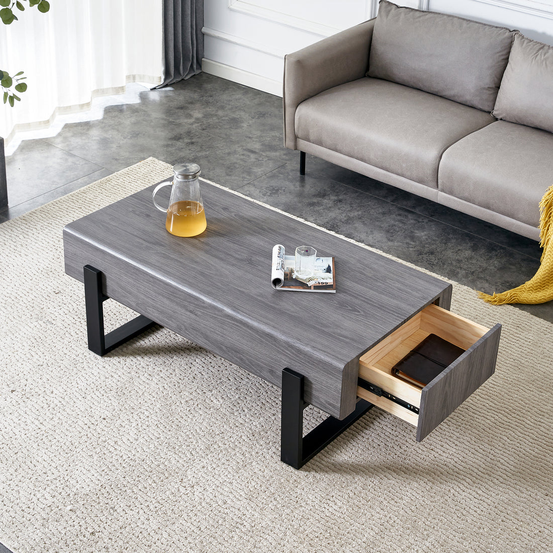 A Coffee Table Made Of Mdf Material. Equipped With Drawers Made Of Solid Wood Material. Can Store Things And Save Space. Paired With Black Metal Table Legs. Suitable For Living Room. Grey Mdf