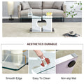 A Rectangular Modern And Fashionable Coffee Table With Tempered Glass Tabletop And White Mdf Legs. Suitable For Living Room.47.2