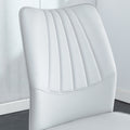 Four Light Gray Dining Chairs. A Medieval Modern Chair Made Of Pu Material With Soft Cushions And Silver Metal Legs. Suitable For Restaurants And Living Rooms Light Gray Pu