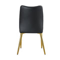 Four Black Dining Chairs. A Medieval Modern Chair Made Of Pu Material With Soft Cushions, Equipped With Golden Metal Legs. Suitable For Restaurants And Living Rooms Black Pu