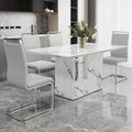 A Simple Dining Table. A Dining Table With A White Marble Pattern. 4 Pu Synthetic Leather High Backrest Cushioned Side Chairs With C Shaped Silver Metal Legs. Dt Sq 16090 Whc 1162 White Mdf