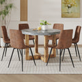 A Modern And Practical Circular Dining Table. Made Of Mdf Tabletop And Wooden Mdf Table Legs.A Set Of 6 Brown Cushioned Chairs In A Modern Medieval Style Restaurant. Ct 403B0502A Natural Wood Mdf