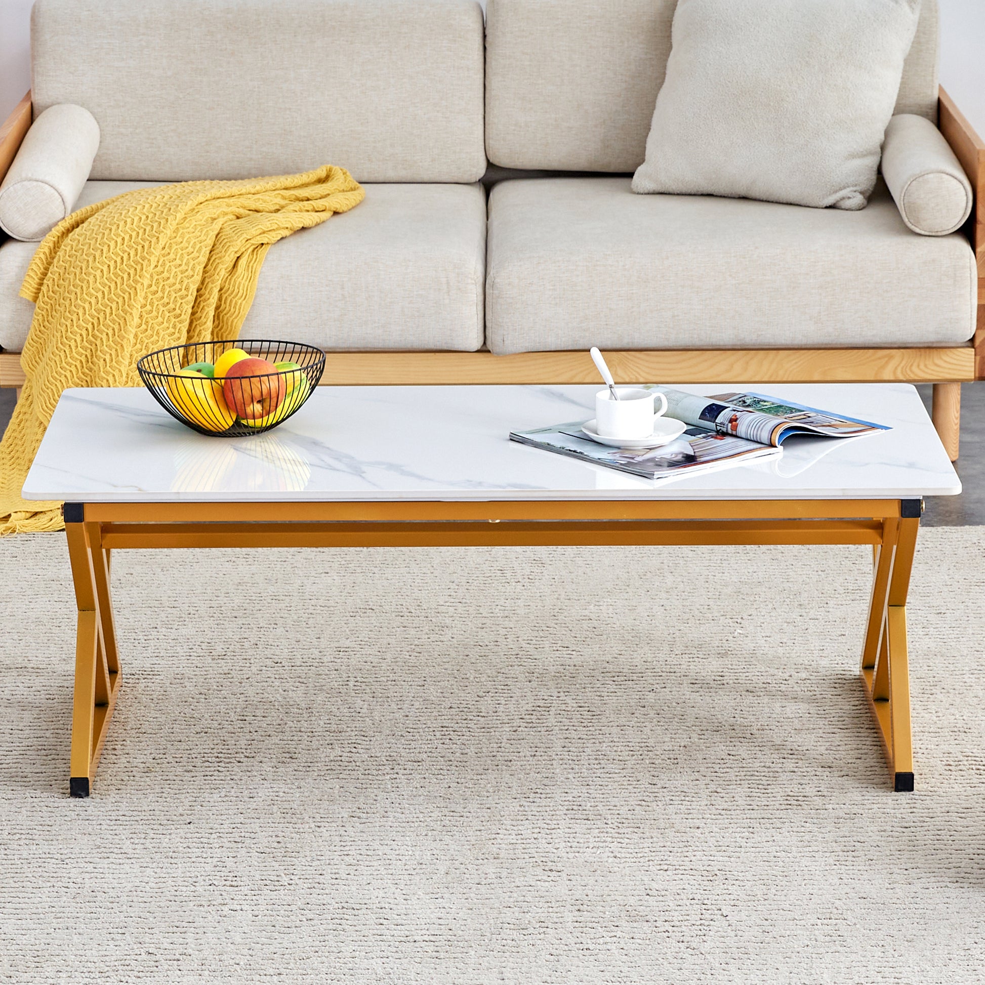 A Coffee Table Made Of Rock Slab Material, With A Smooth And Natural Surface That Complements The Modern Design Of The Golden Metal Legs, Making It Suitable For Living Rooms Of All Sizes.47*23.6 White Gold Sintered Stone