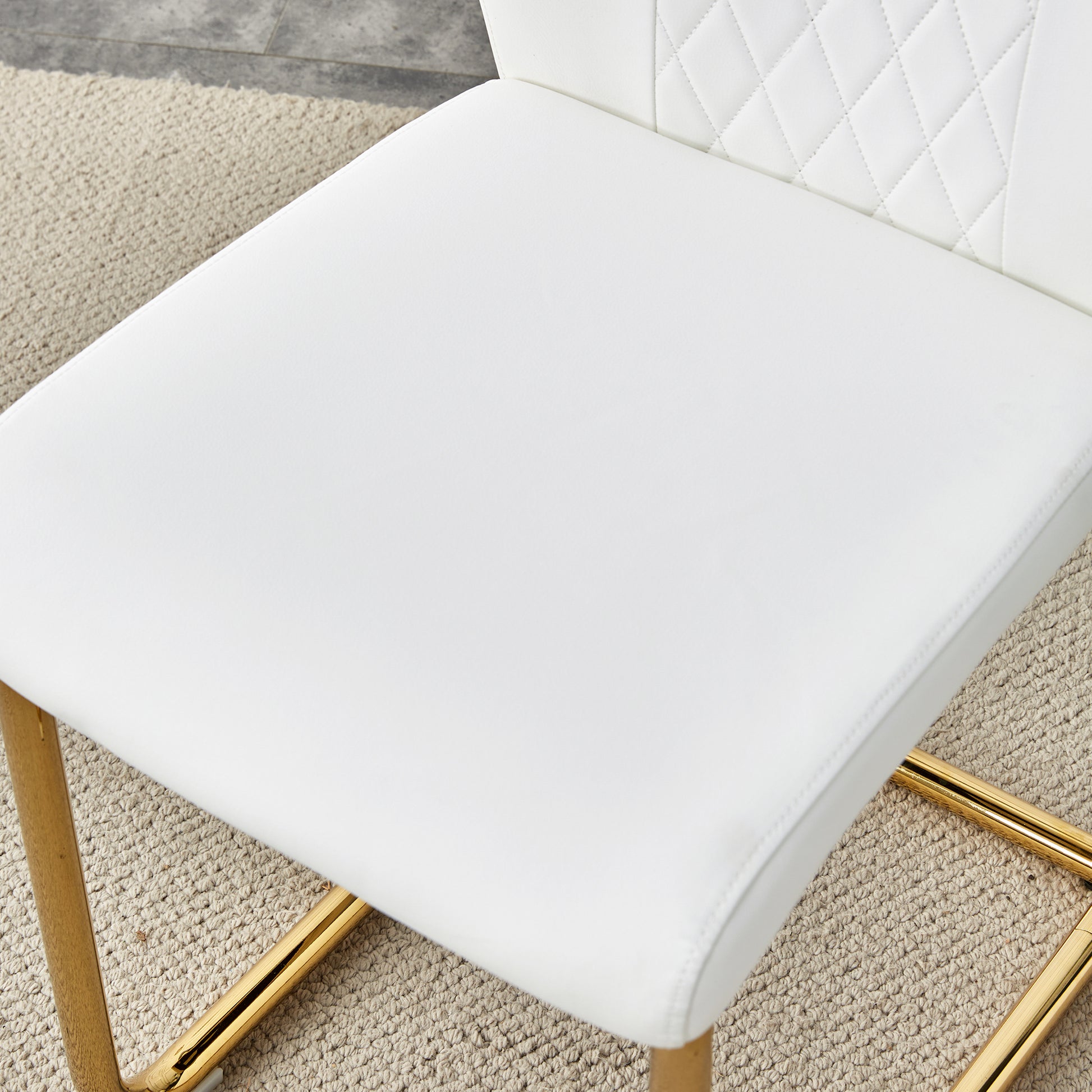 A Modern Minimalist Style Round Transparent Tempered Glass Table With Gold Metal Legs, Paired With 4 Modern Pu Leather High Back Dining Chairs Bring A Luxurious Experience. White Seats 4 Glass Metal