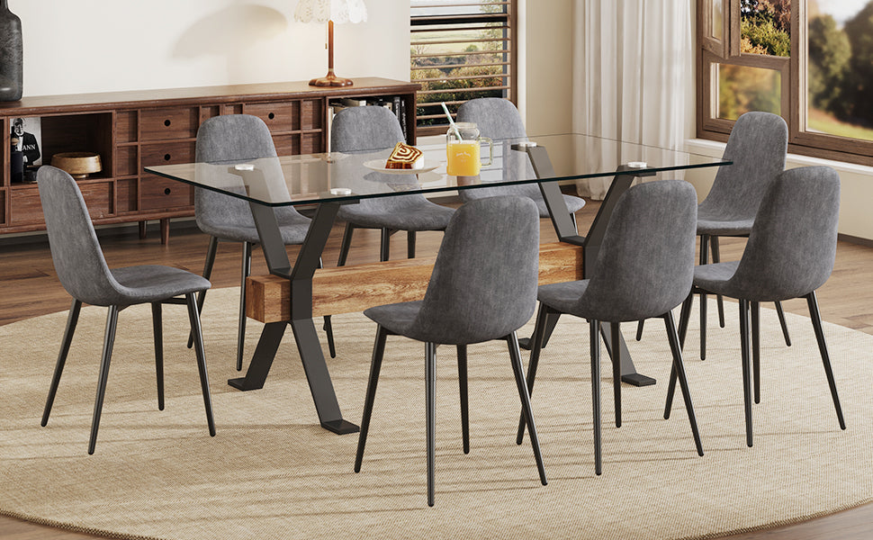 Dining Table. Modern Tempered Glass Dining Table. Large Modern Office Desk With Black Metal Legs And Mdf Crossbars, Suitable For Home And Office Use. 8 High End Cushioned Seats.F1105 B0501A Transparent Mdf Glass