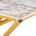 A Coffee Table Is Made Of Rock Slab Material, With A Natural And Smooth Marble Pattern On The Surface, Which Complements The Modern Design Of The Golden Metal Legs And Adds A Touch Of Fashion.47*23.6 Gold Sintered Stone