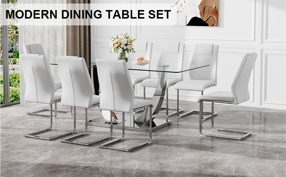 Table And Chair Set.Contemporary, Minimalist Rectangular Dining Table Featuring A Clear Tempered Glass Top And Sleek Silver Legs. Paried With Chairs Made Of Pu Material Cushion And Silver Metal Legs. White Seats 8 Glass Metal