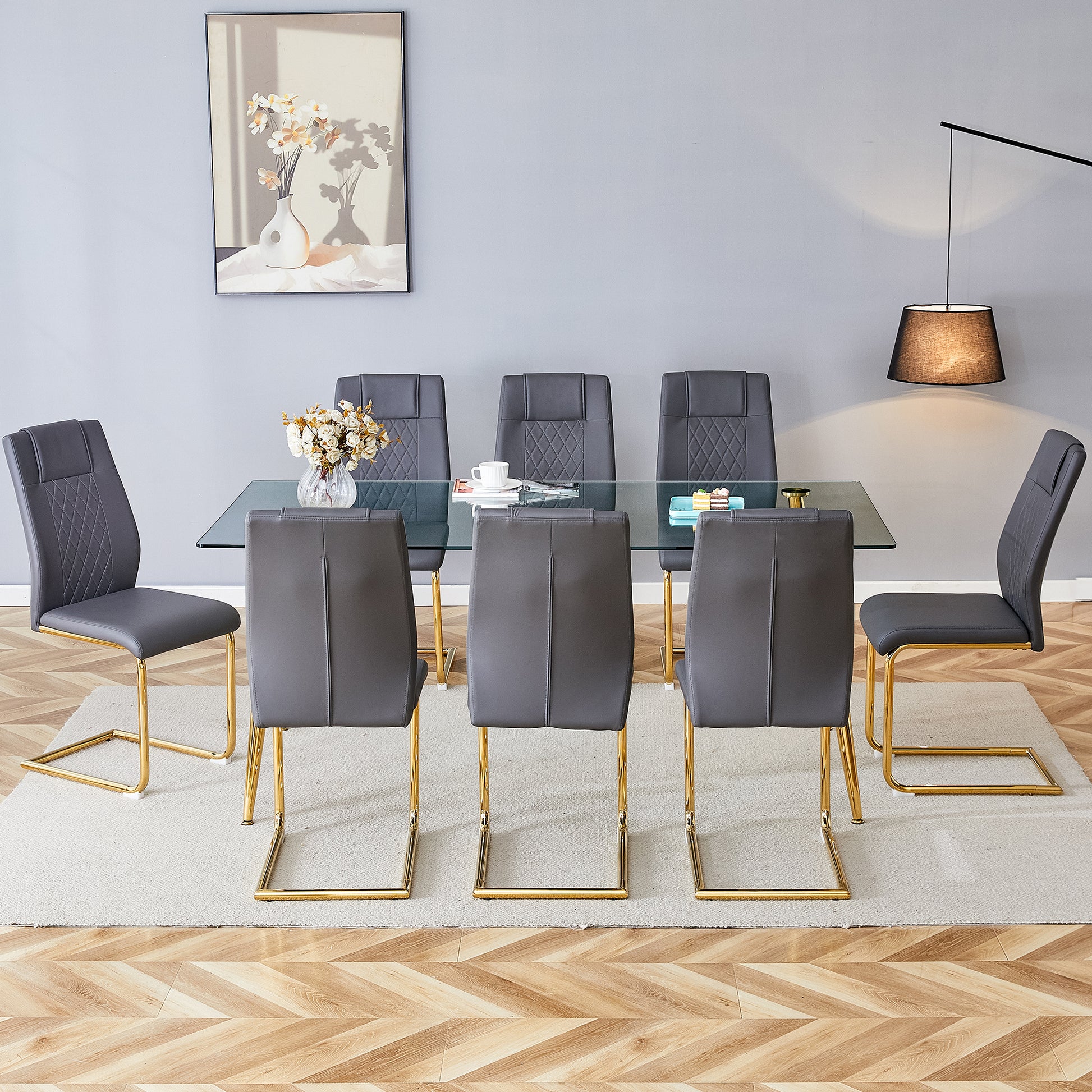 Table And Chair Set.Modern Rectangular Glass Dining Table With A Tempered Glass Tabletop And Metal Legs, Paired With Multiple Chairs Designed With Pu Cushions And Golden Metal Legs. Grey Gold Seats 8 Tempered Glass