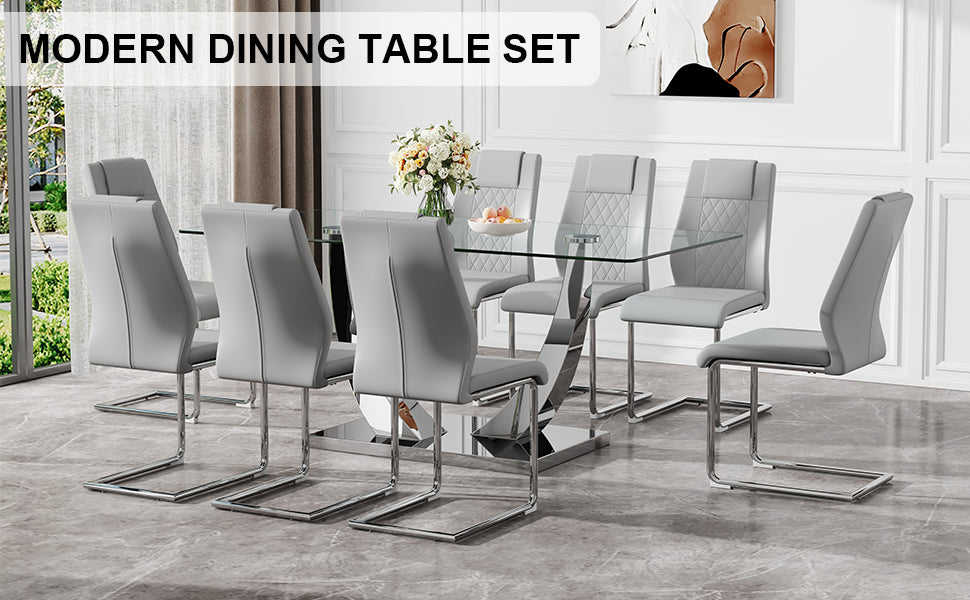 Table And Chair Set.Contemporary, Minimalist Rectangular Dining Table Featuring A Clear Tempered Glass Top And Sleek Silver Legs. Paried With Chairs Made Of Pu Material Cushion And Silver Metal Legs. Gray Seats 8 Glass Metal