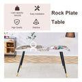 Table And Chair Set, Imitation Marble Texture Rock Board Table Top, Black Metal Table Legs. Paired With 6 White Artificial Leather Backrest Cushion Dining Chairs With Black Metal Legs. White Black Seats 6 Metal