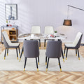 Modern Minimalist Dining Table. Imitation Marble Patterned Stone Burning Tabletop With Black Metal Legs.Modern Dining Chair With Pu Artificial Leather Backrest Cushion And Black Metal Legs.F 001 C 007 Black Gold Sintered Stone