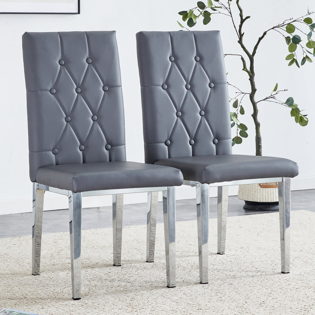 2 Piece Set Of Gray Armless Dining Chairs Brings A Touch Of Elegance And Mystery To The Dining Area With Its Deep Gray Tone,The Grid And Buckle Design Of The Back Add A Vintage Yet Fashionable Touch Gray Set Of 2 Pu