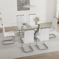 Table And Chair Set. Large Modern Rectangular Table With Glass Top And Silver Metal Legs. Furnished With Soft And Comfortable Pu Chairs With Faux Leather Upholstered Seats And Silver Metal Legs. White Silver Seats 6 Glass Metal