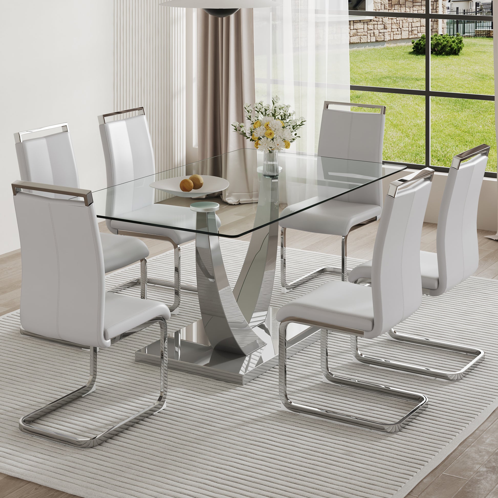 Table And Chair Set. Large Modern Rectangular Table With Glass Top And Silver Metal Legs. Furnished With Soft And Comfortable Pu Chairs With Faux Leather Upholstered Seats And Silver Metal Legs. Gray Silver Seats 6 Glass Metal