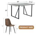 Table And Chair Set. A Minimalist Retro Rectangular Dining Table With A Specially Textured Top And Black Metal Legs, Paired With 4 Soft Chairs And Black Metal Legs, Showcases A Beautiful Home Style.