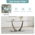 Table And Chair Set. Large Modern Rectangular Table With Glass Top And Silver Metal Legs. Furnished With Soft And Comfortable Pu Chairs With Faux Leather Upholstered Seats And Silver Metal Legs. Gray Silver Seats 6 Glass Metal