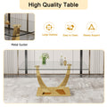 Modern Simple Rectangular Dining Table With Clear Glass Top And Smooth Gold Legs. Suitable For Kitchen, Dining Room And Living Room. Golden Glass