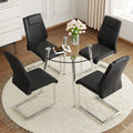 A Modern Minimalist Round Transparent Tempered Glass Table With Silver Metal Legs And 4 Modern Pu Leather High Backed Dining Chairs For A Luxurious Experience. Black Seats 4 Glass Metal